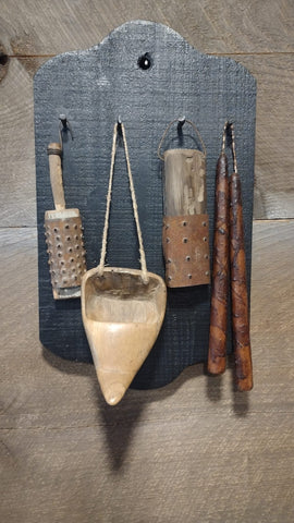 Black Wall Hanging With 4 Old Black Nails