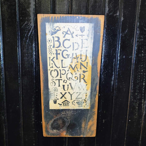 Primitive Stenciled ABCs On An Old Piece Of Board