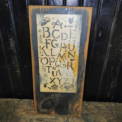 Primitive Stenciled ABCs On An Old Piece Of Board