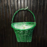 Vintage Painted Green Wire Basket. The inside is white.