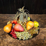 Decorative fruit lot with tin fluted platter