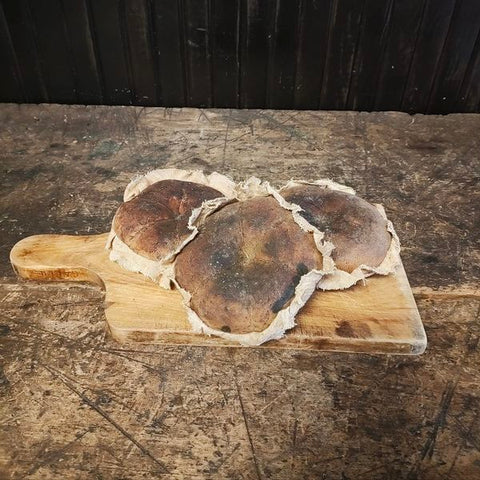 Primitive grouping of a vintage cutting board