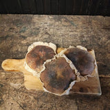 Primitive grouping of a vintage cutting board