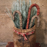 Primitive Jar With fabrics Candy Canes And Greenery