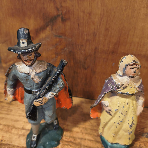 Vintage Hand-Painted Cast-Iron Pilgrim Figurines