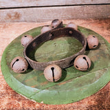 Antique primitive bells on a leather strap