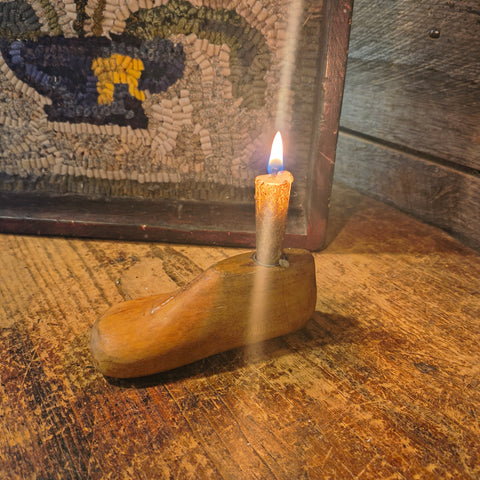 Antique Hooked Matt Inserted into a Red Painter Sorting Tray with Shoe Mold Candle Holder