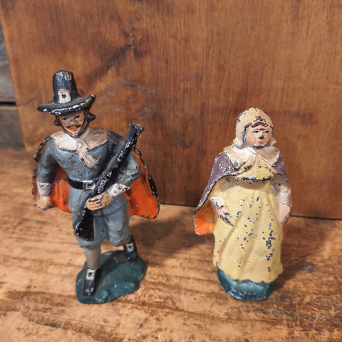 Vintage Hand-Painted Cast-Iron Pilgrim Figurines