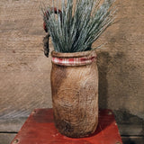 Primitive Jar With fabrics Candy Canes And Greenery