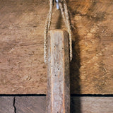 Antique primitive hanger with dried tobacco leaves
