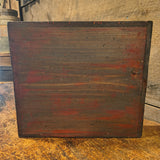 Antique Hooked Matt Inserted into a Red Painter Sorting Tray with Shoe Mold Candle Holder
