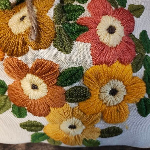 Vintage embroidered flowers on a linen bag