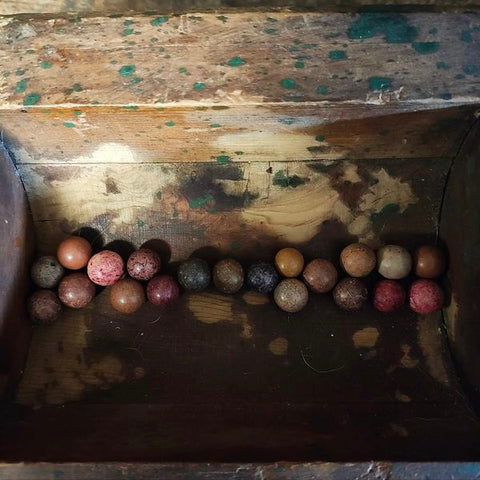 Antique clay marbles, earth tone