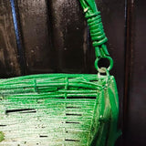 Vintage Painted Green Wire Basket. The inside is white.