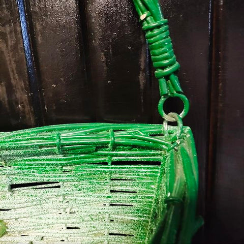 Vintage Painted Green Wire Basket. The inside is white.