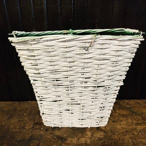 Vintage Painted Green Wire Basket. The inside is white.