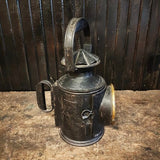 Antique railroad lantern handheld