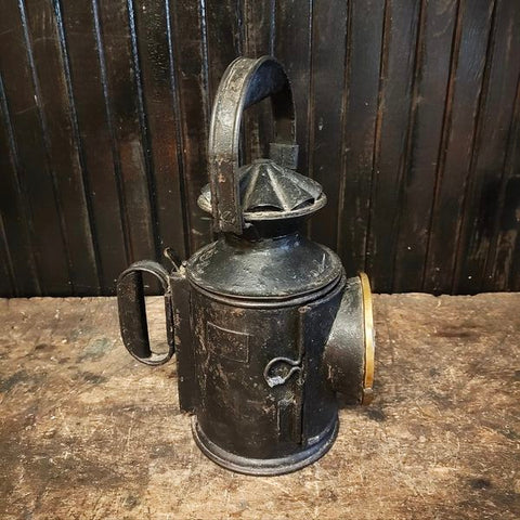 Antique railroad lantern handheld