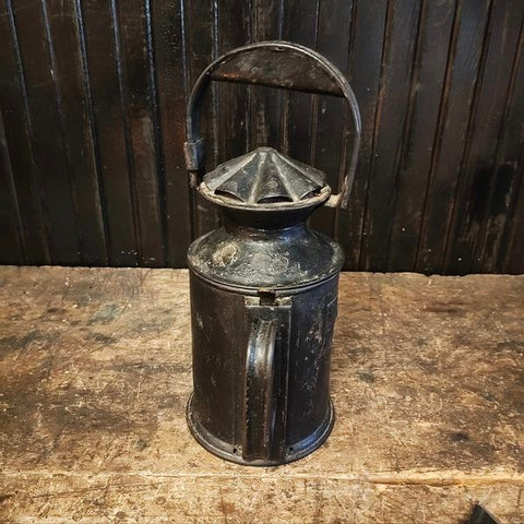 Antique railroad lantern handheld