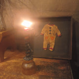 Antique primitive wooden box with a handmade Halloween costume