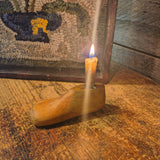 Antique Hooked Matt Inserted into a Red Painter Sorting Tray with Shoe Mold Candle Holder