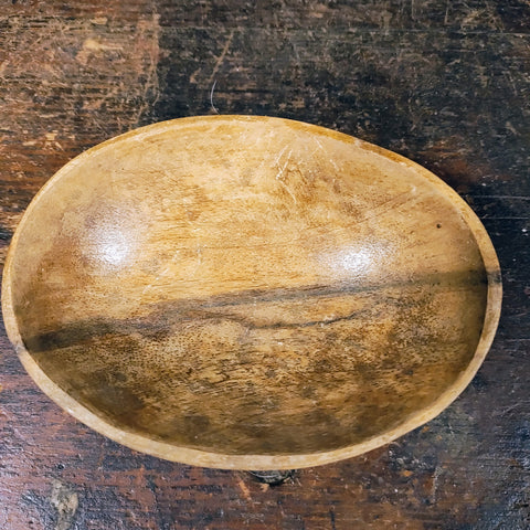 Antique Clay Marvels in an antique wooden bowl