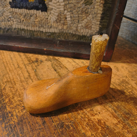 Antique Hooked Matt Inserted into a Red Painter Sorting Tray with Shoe Mold Candle Holder