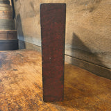Antique Hooked Matt Inserted into a Red Painter Sorting Tray with Shoe Mold Candle Holder