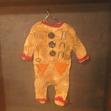 Antique primitive wooden box with a handmade Halloween costume