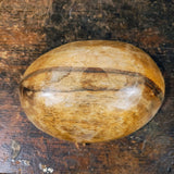 Antique Clay Marvels in an antique wooden bowl