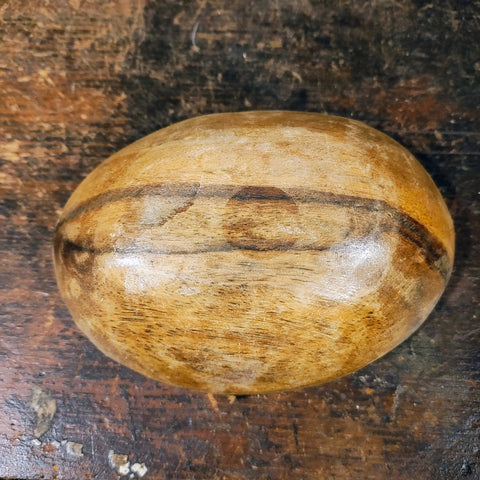 Antique Clay Marvels in an antique wooden bowl